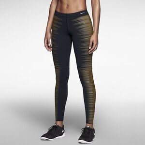 Nike Women's Black Leggings with Gold Accents